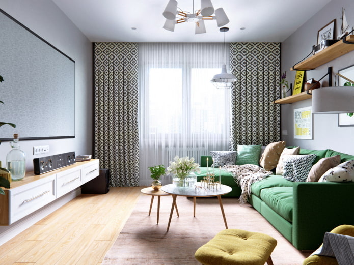 šviesus kambarys su žalia sofa