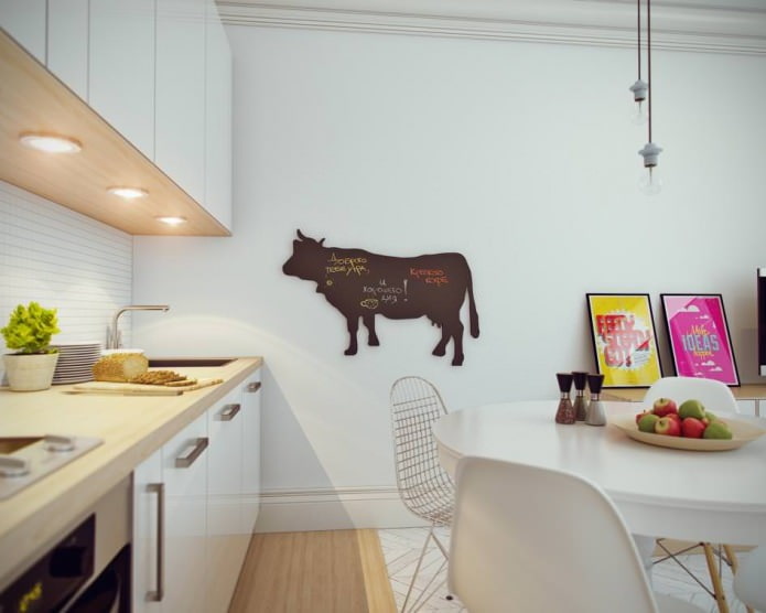 kitchen in the interior design of a small studio apartment of 24 square meters. m