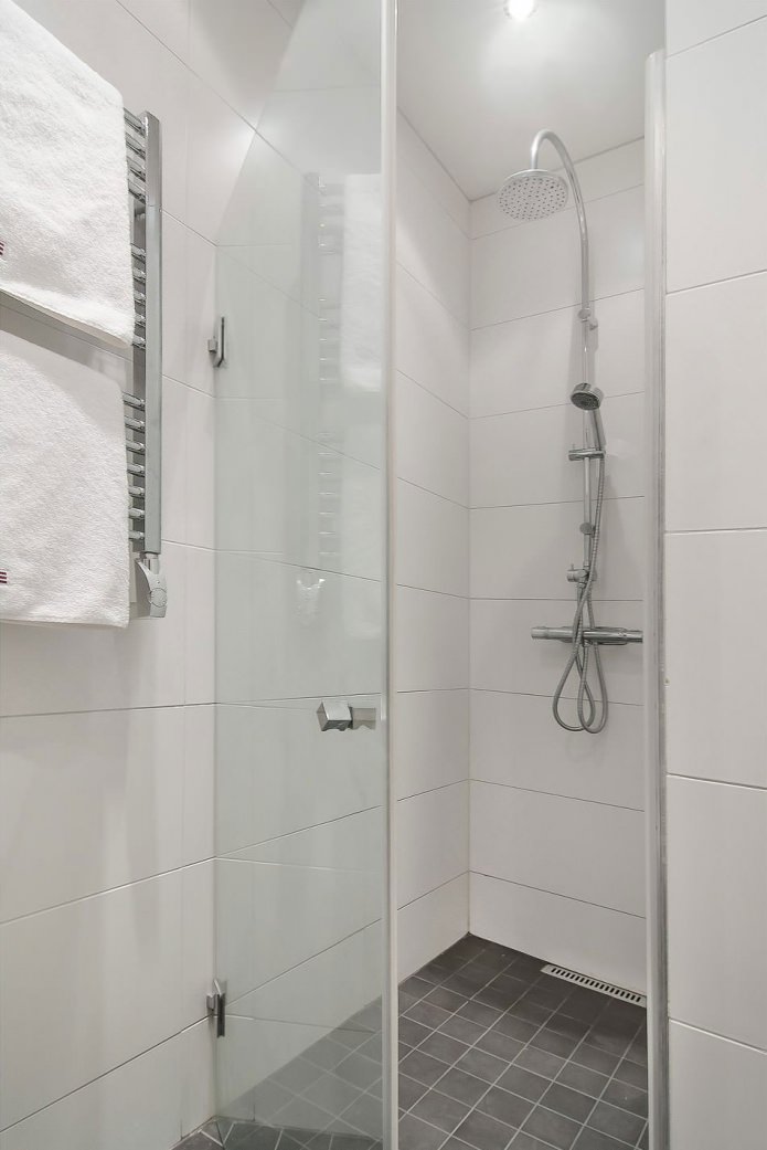 shower in the Swedish interior of the studio apartment 34 sq. m