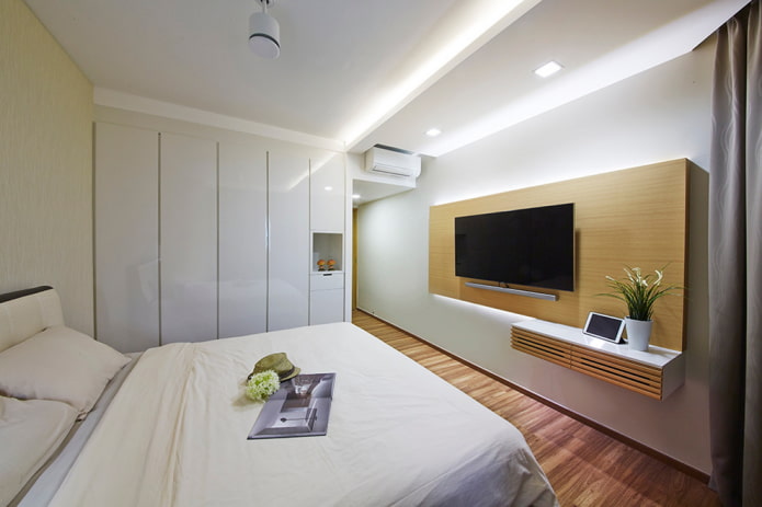 TV i soveværelset: placeringsindstillinger, design, fotos i forskellige interiørstilarter