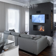 Phòng khách với lò sưởi và TV: tầm nhìn, lựa chọn tường, ý tưởng cho một căn hộ và một ngôi nhà-3