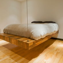 מיטה מרחפת בפנים: סוגים, צורות, עיצוב, אפשרויות עם תאורה אחורית -1