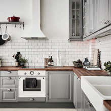 Quais são os aventais para a cozinha: fotos no interior e características de escolha-1