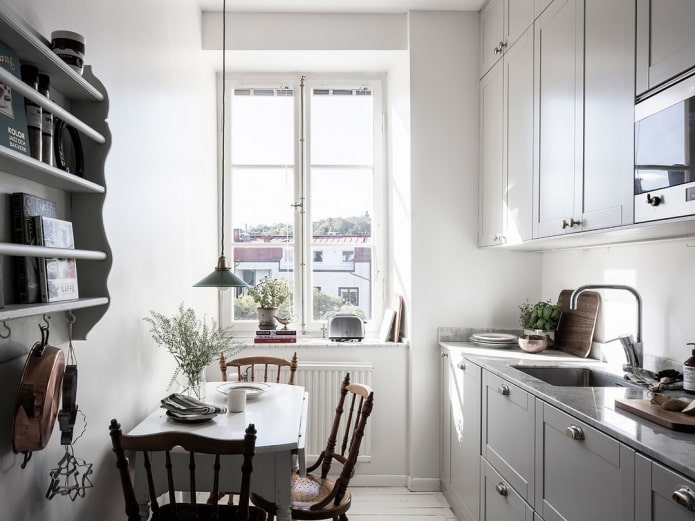 Come creare un design armonioso di una piccola cucina di 8 mq?