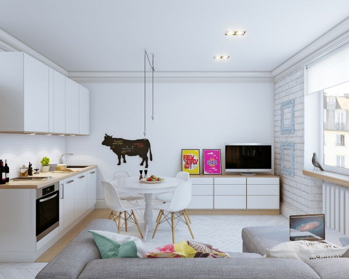 Skandynawski wystrój małego mieszkania typu studio o powierzchni 24 metrów kwadratowych. m